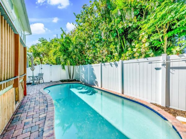 A Serene 3 BR Coastal Home with Pool in Holmes Beach A Block to Beach