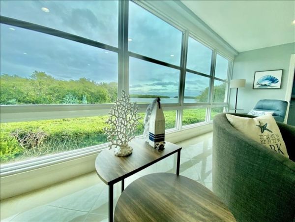 Bayside Condo with Bay Views, 2 Communal Pools, 2 Tennis Courts & Gym!