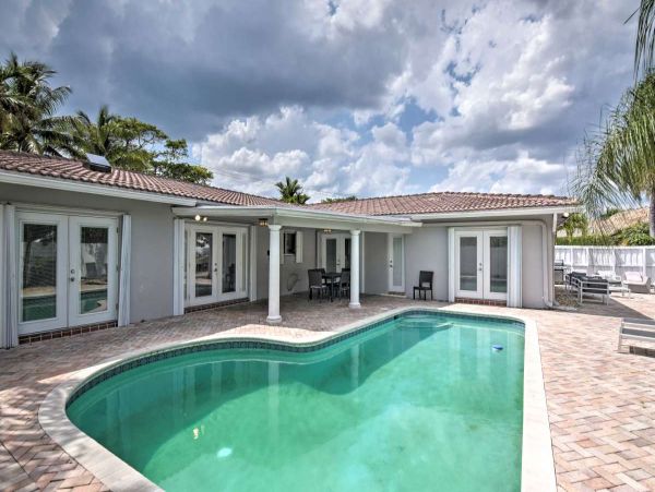 Canalfront Four Bedroom Vacation Home with Private Pool & Boat Dock