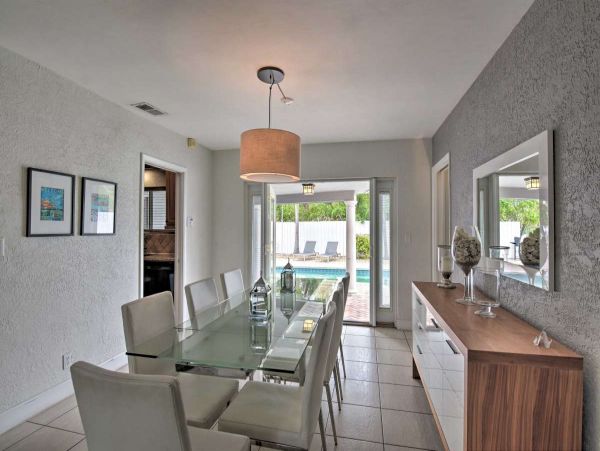 Canalfront Four Bedroom Vacation Home with Private Pool & Boat Dock