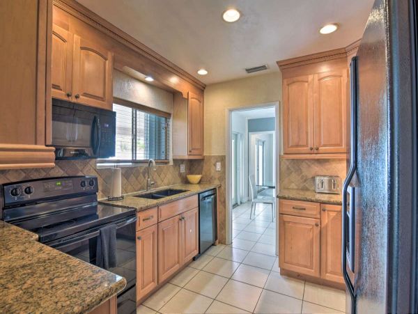 Canalfront Four Bedroom Vacation Home with Private Pool & Boat Dock