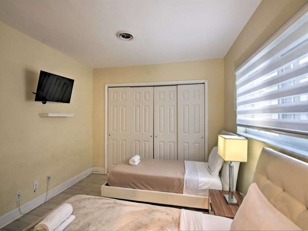 Canalfront Four Bedroom Vacation Home with Private Pool & Boat Dock
