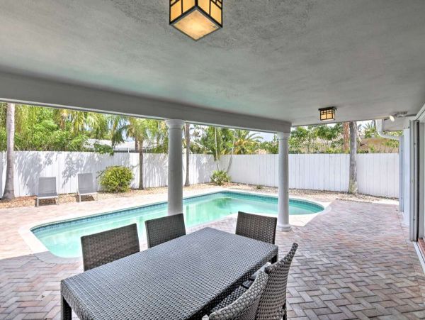 Canalfront Four Bedroom Vacation Home with Private Pool & Boat Dock