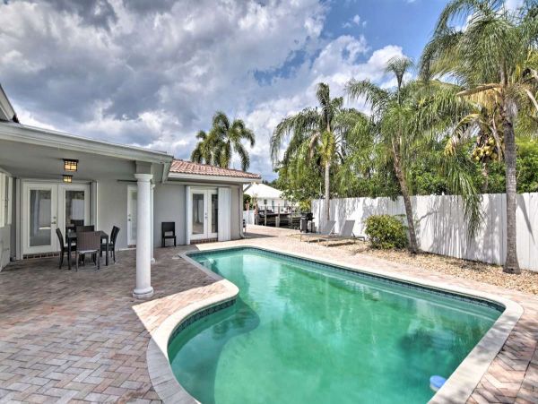 Canalfront Four Bedroom Vacation Home with Private Pool & Boat Dock