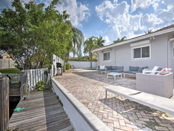 Canalfront Four Bedroom Vacation Home with Private Pool & Boat Dock