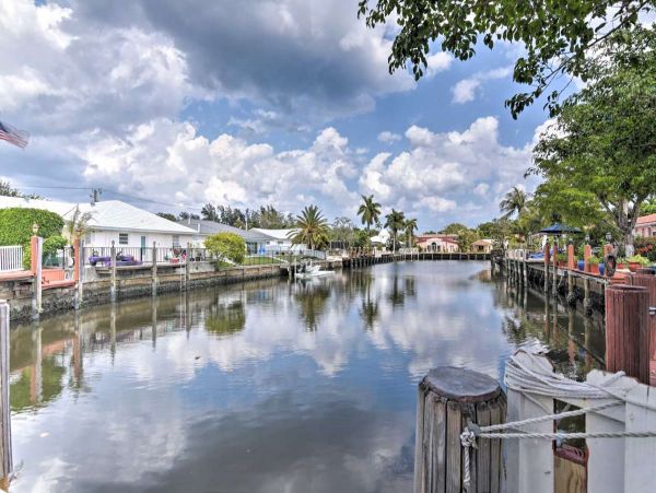 Canalfront Four Bedroom Vacation Home with Private Pool & Boat Dock