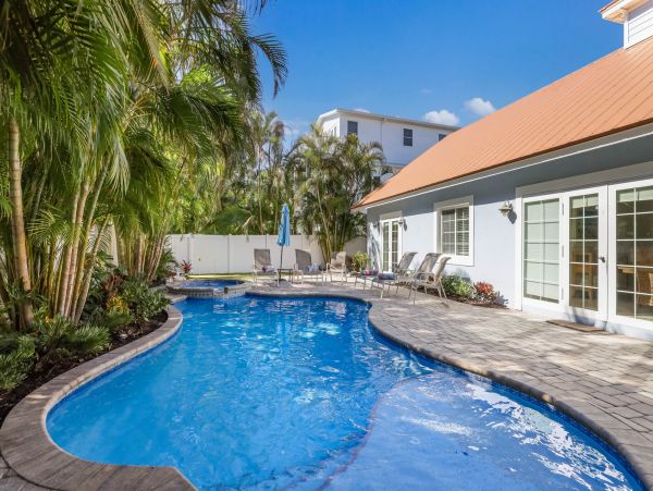 Beautiful 4 Bedroom Home with Pool & Short Walk to Beach