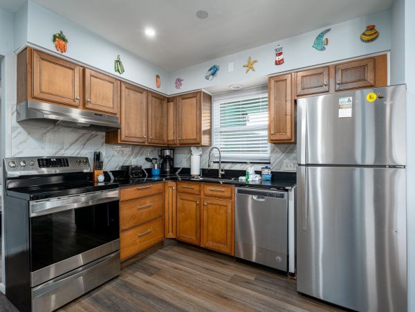 Newly Renovated Four Bedroom Home Short Walk to Beach