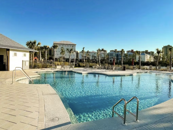 Luxury Four Bedroom Beach Home with Shared Pool Walk to Beach