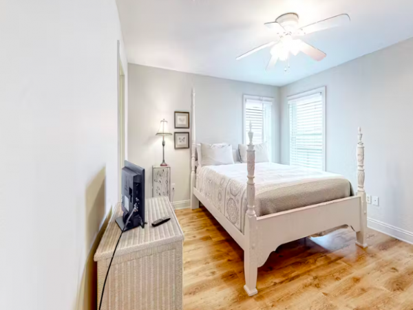 Spacious five bedroom home with community pool