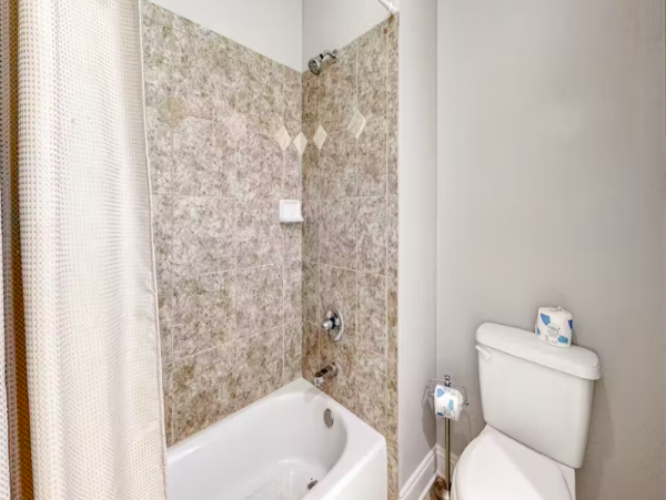 Spacious five bedroom home with community pool