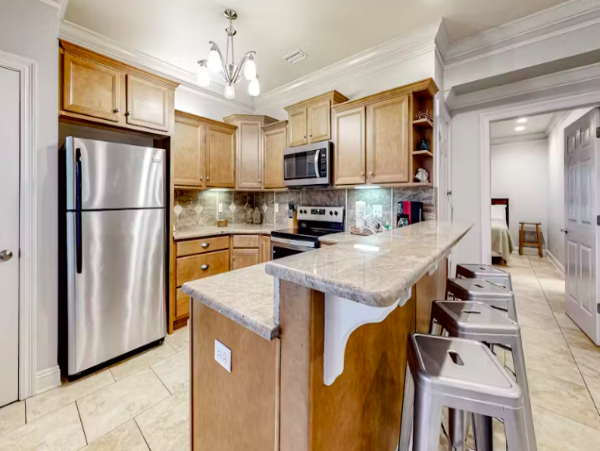 Spacious five bedroom home with community pool