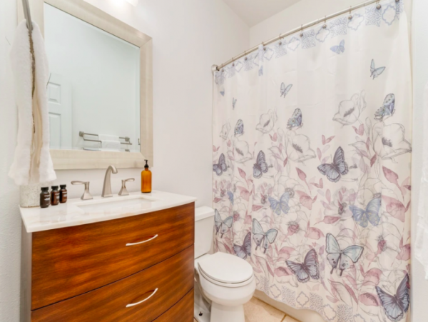 Charming Coastal Bungalow in Destin with Pool and Separate Carriage House Steps from the Beach