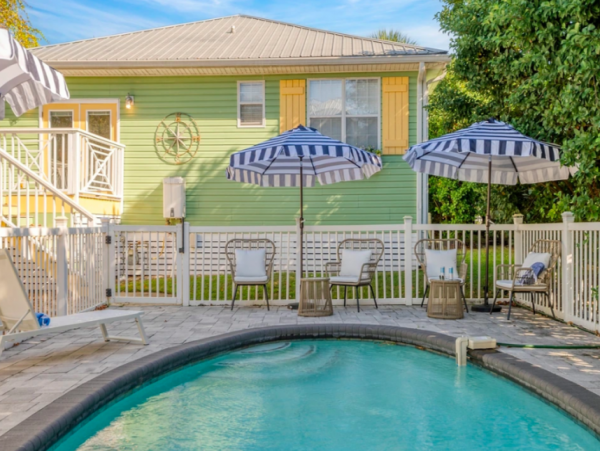 Charming Coastal Bungalow in Destin with Pool and Separate Carriage House Steps from the Beach