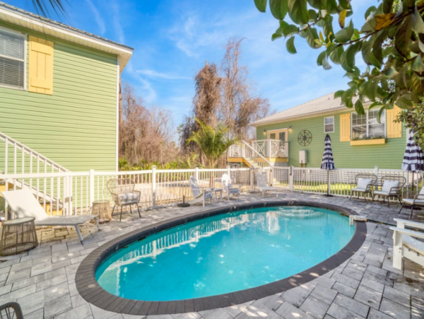 Charming Coastal Bungalow in Destin with Pool and Separate Carriage House Steps from the Beach