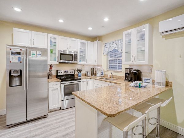 Lovely Two Bedroom Home with Private Pool Walk to Beach