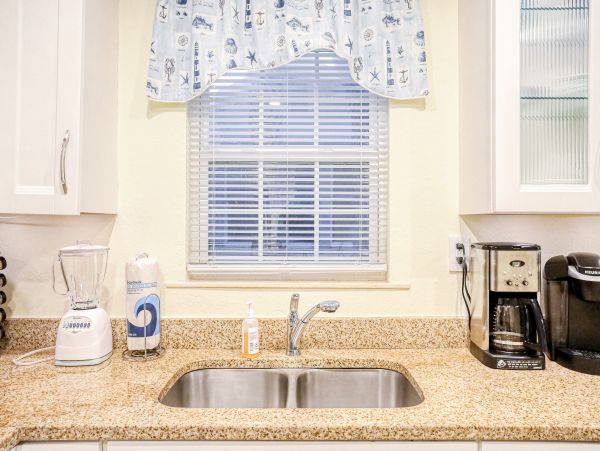 Lovely Two Bedroom Home with Private Pool Walk to Beach