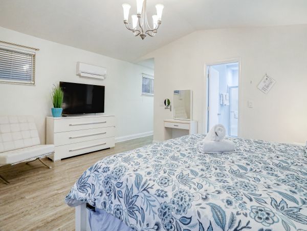 Lovely Two Bedroom Home with Private Pool Walk to Beach