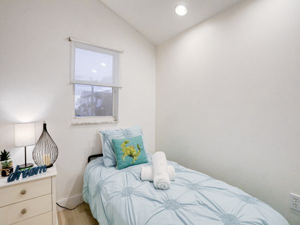 Lovely Two Bedroom Home with Private Pool Walk to Beach