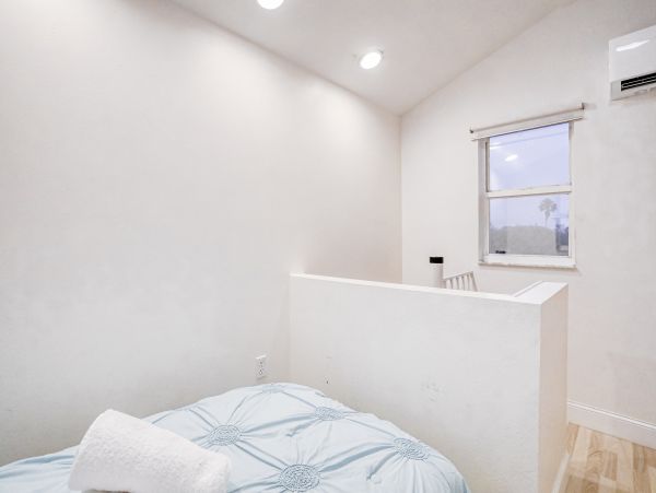 Lovely Two Bedroom Home with Private Pool Walk to Beach