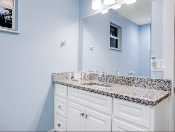 Lovely Two Bedroom Home with Private Pool Walk to Beach