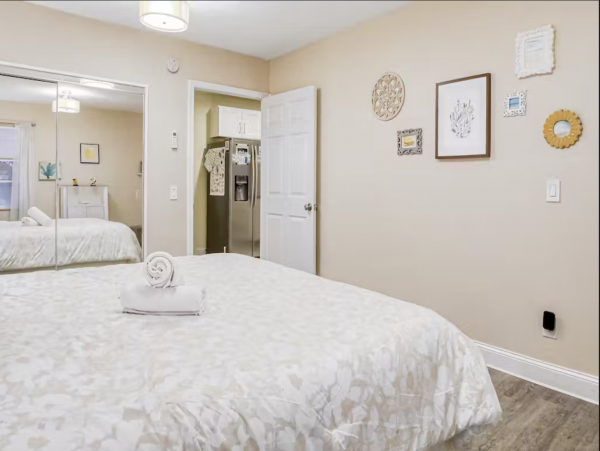 Lovely Two Bedroom Home with Private Pool Walk to Beach