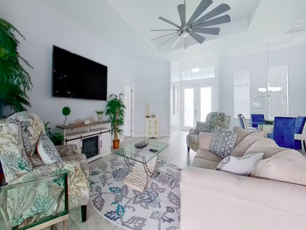 Tranquil Canal-Front Home with Caged Pool in Cape Coral