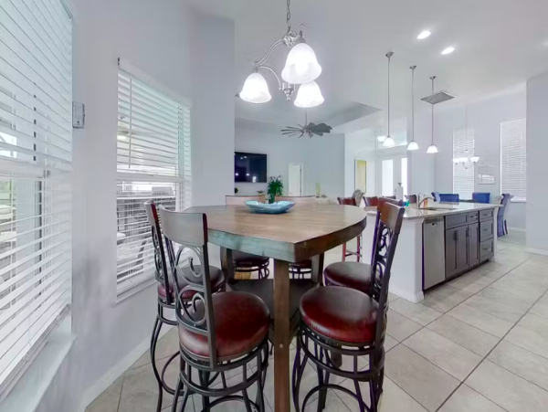 Tranquil Canal-Front Home with Caged Pool in Cape Coral