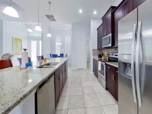 Tranquil Canal-Front Home with Caged Pool in Cape Coral