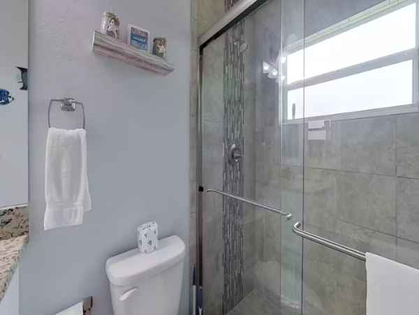 Tranquil Canal-Front Home with Caged Pool in Cape Coral