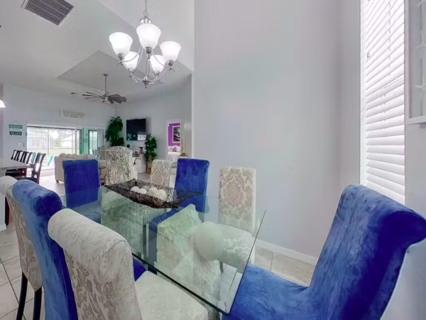 Tranquil Canal-Front Home with Caged Pool in Cape Coral