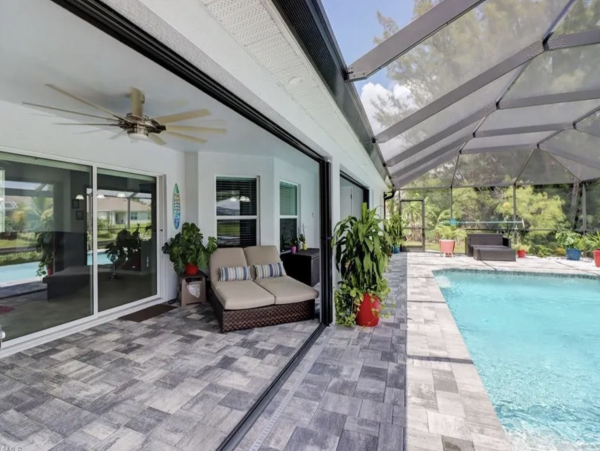 Tranquil Canal-Front Home with Caged Pool in Cape Coral