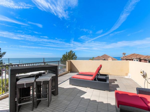 Treasure Island Beachfront Vacation Rental Sunset Beach Luxury Home with Rooftop Deck