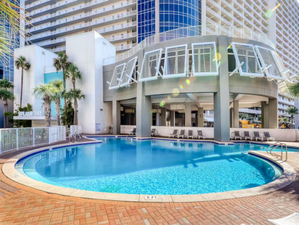 Steps to Beach 2 Bedroom Condo with Pools, Shopping, Dining & More!!