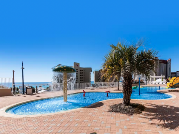 Steps to Beach 2 Bedroom Condo with Pools, Shopping, Dining & More!!