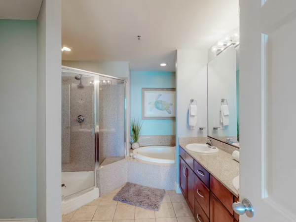 Steps to Beach 2 Bedroom Condo with Pools, Shopping, Dining & More!!