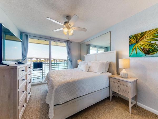 St. Pete Beach Vacation Rental Bayfront Condo with Pool & Balcony Views