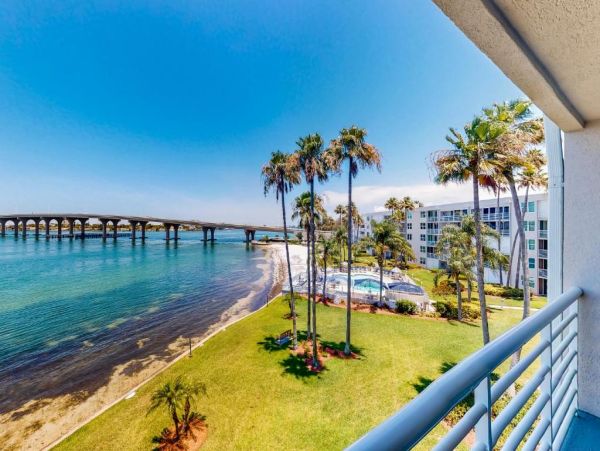 St. Pete Beach Vacation Rental Bayfront Condo with Pool & Balcony Views