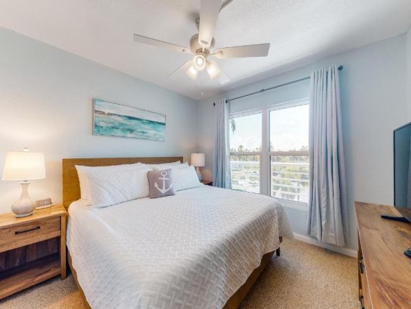 St. Pete Beach Vacation Rental Bayfront Condo with Pool & Balcony Views
