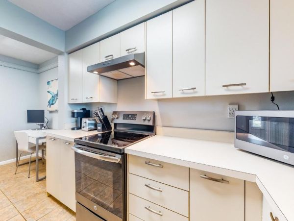 St. Pete Beach Vacation Rental Bayfront Condo with Pool & Balcony Views