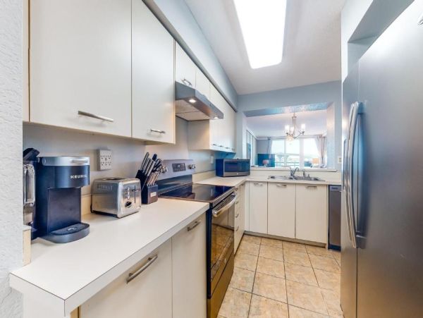 St. Pete Beach Vacation Rental Bayfront Condo with Pool & Balcony Views