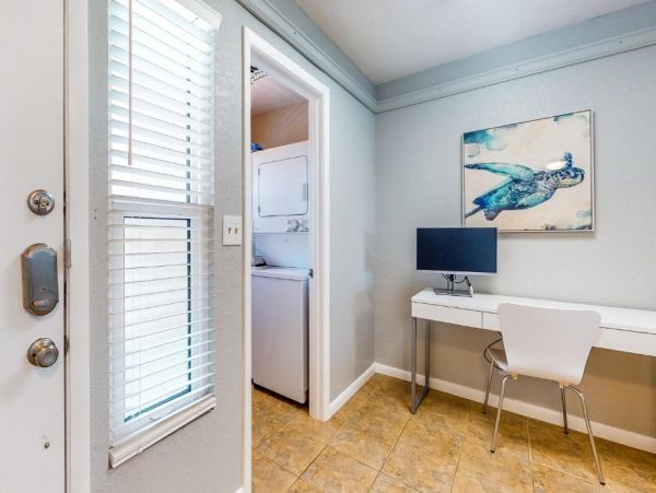 St. Pete Beach Vacation Rental Bayfront Condo with Pool & Balcony Views