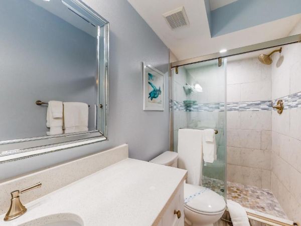 St. Pete Beach Vacation Rental Bayfront Condo with Pool & Balcony Views