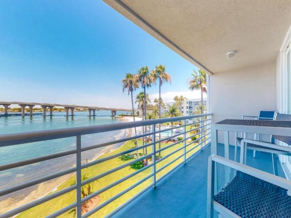St. Pete Beach Vacation Rental Bayfront Condo with Pool & Balcony Views