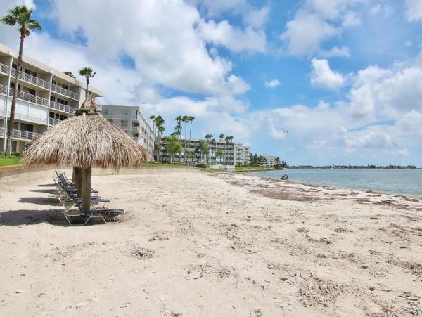 St. Pete Beach Vacation Rental Bayfront Condo with Pool & Balcony Views