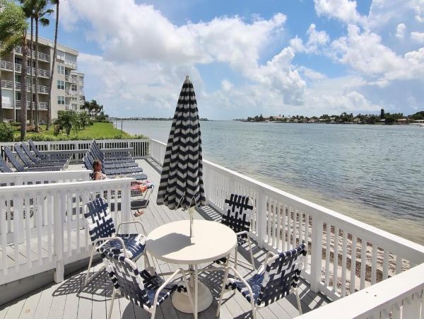 St. Pete Beach Vacation Rental Bayfront Condo with Pool & Balcony Views