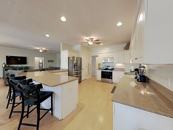 Choose this 5 Bdrm Home and Enjoy the Shores of Scenic Fort Morgan