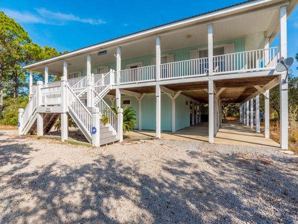 Choose this 5 Bdrm Home and Enjoy the Shores of Scenic Fort Morgan