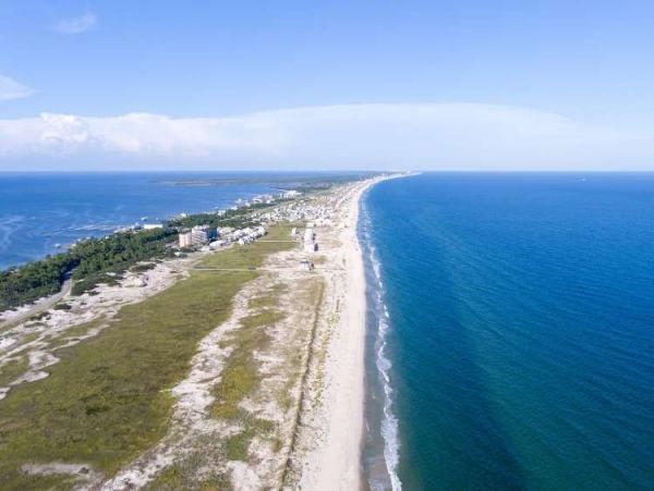 Choose this 5 Bdrm Home and Enjoy the Shores of Scenic Fort Morgan