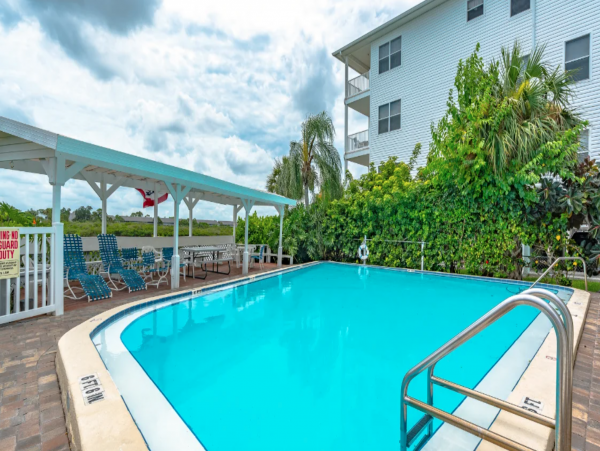 Nice looking condo a block from beach with Resort View